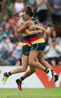 AFLW 2017 Rd 01 - Adelaide v GWS Giants ADELAIDE, AUSTRALIA - FEBRUARY 4: Deni Varnhagen and Ebony Marinoff of the Crows celebrate a goal during the 2017 AFLW Round 01 match between the Adelaide Crows and the GWS Giants at Thebarton Oval on February 4, 2017 in Adelaide, Australia. (Photo by James Elsby/AFL Media)